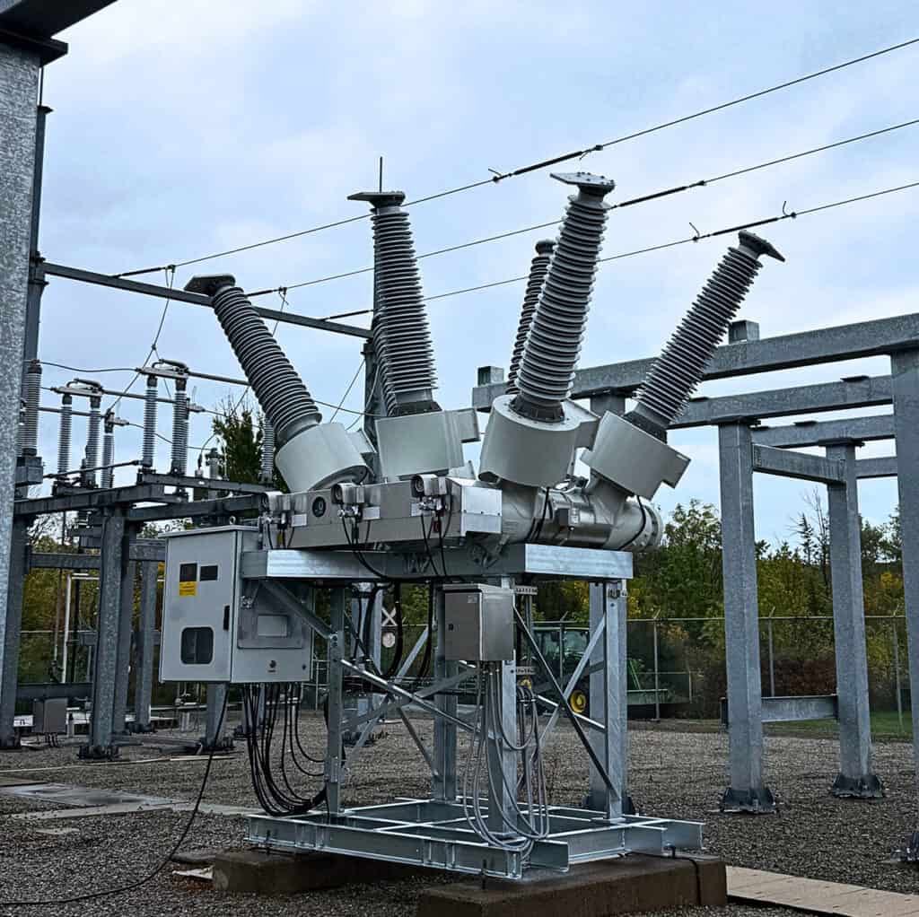 High-voltage dead tank circuit breaker in outdoor utility substation
