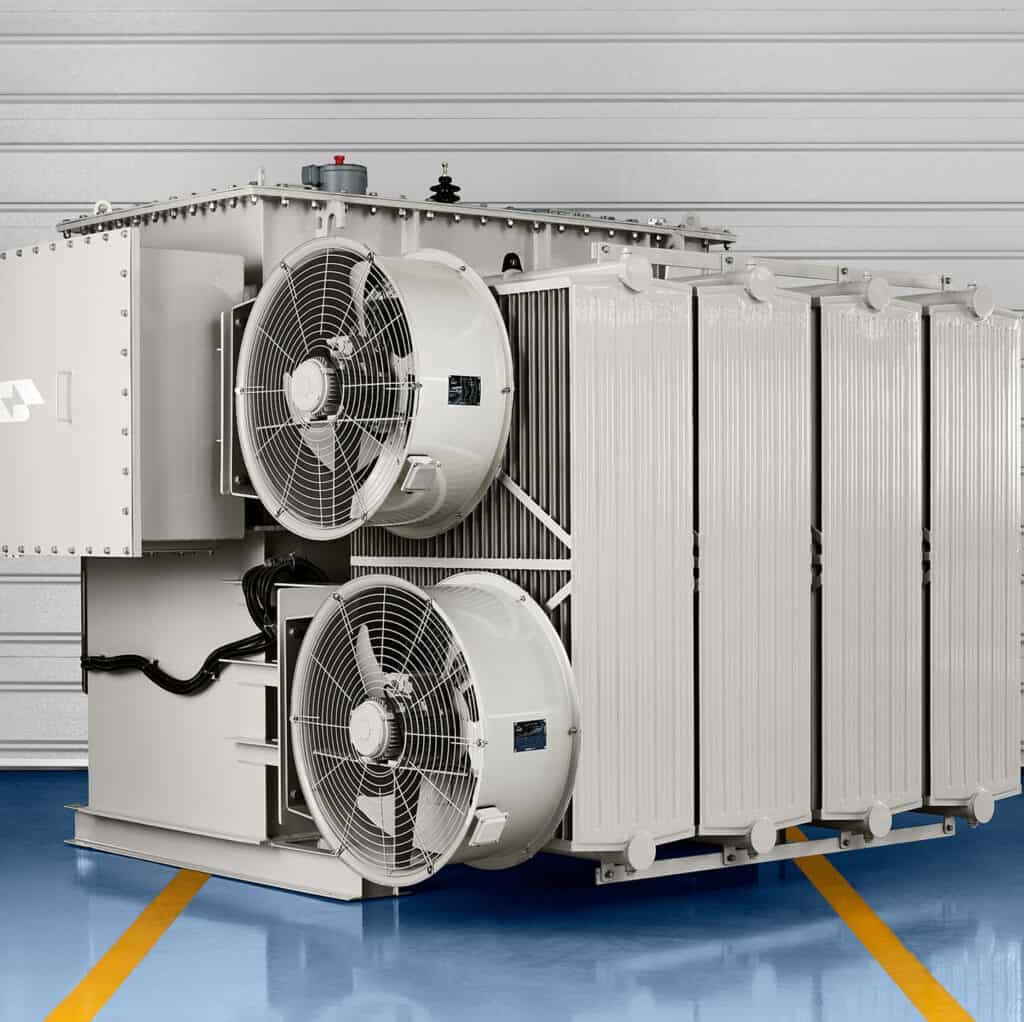 Substation power transformer with radiator bank and fan cooling
